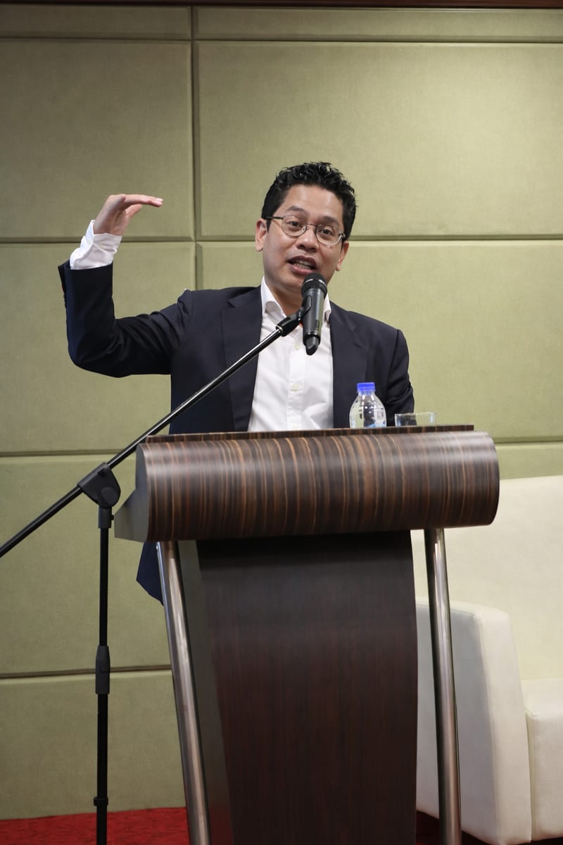 登壇して講演する MPJA 代表理事 Akmal Bin Abu Hassan