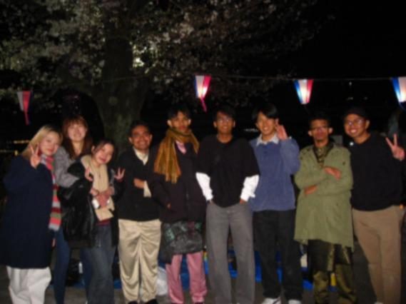 Interns sharing a meal with local hosts during a cultural exchange activity